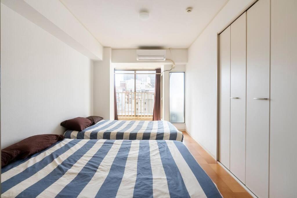 ２ beds. Comfortable . Dotonbori / Kuromon Market., Ósaka