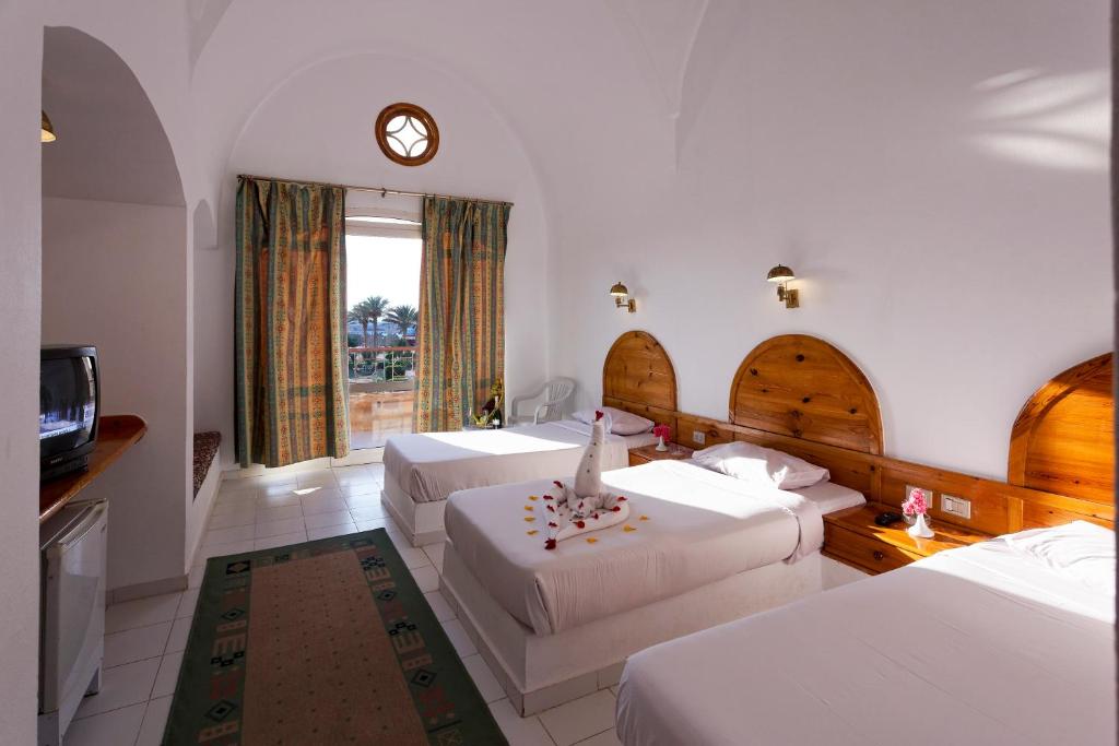 Pensee Beach Resort Marsa Alam operated by The Three Corners Hotels & Resorts photo