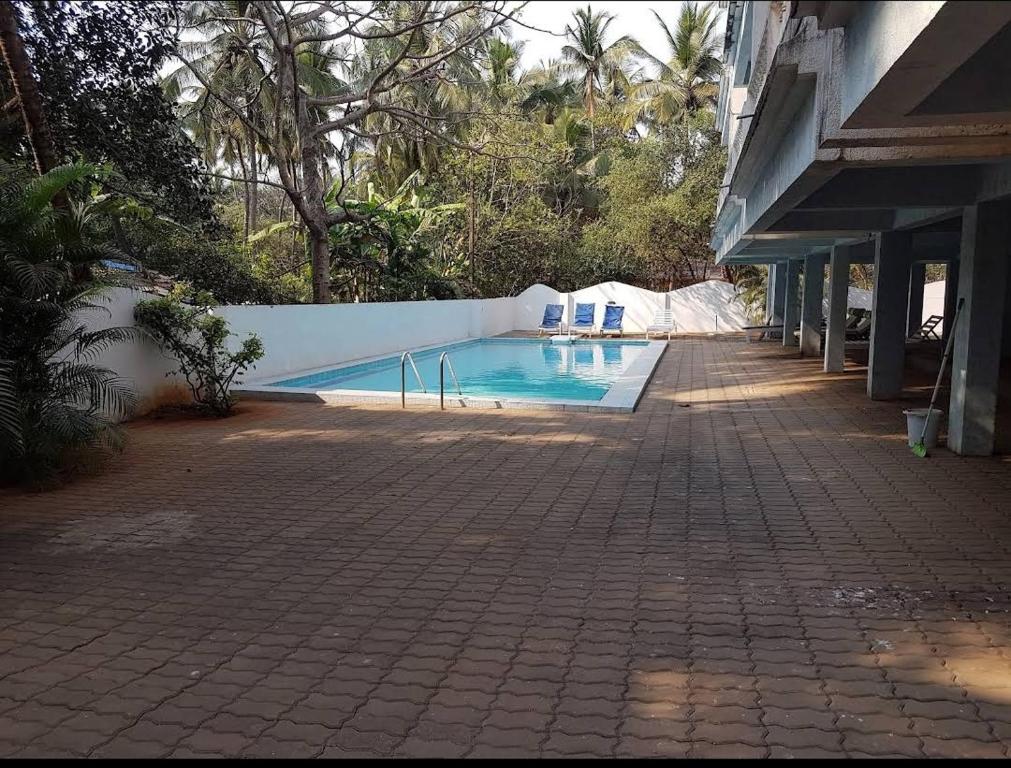 Swimming pool, OYO 14964 Greenfield View in Goa