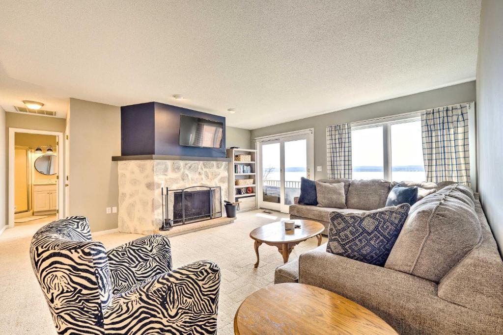 Waterfront Dewittville Condo with Furnished Balcony!