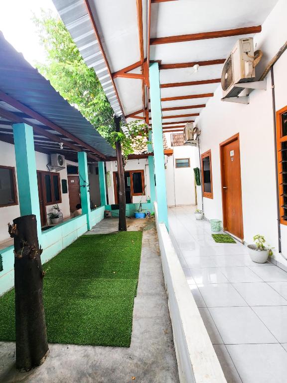 Homey Guesthouse Kertajaya - Syariah photo