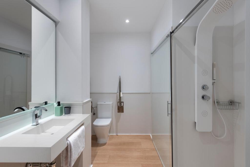 Suites Maestranza - Santas Patronas by Magno Apartments photo