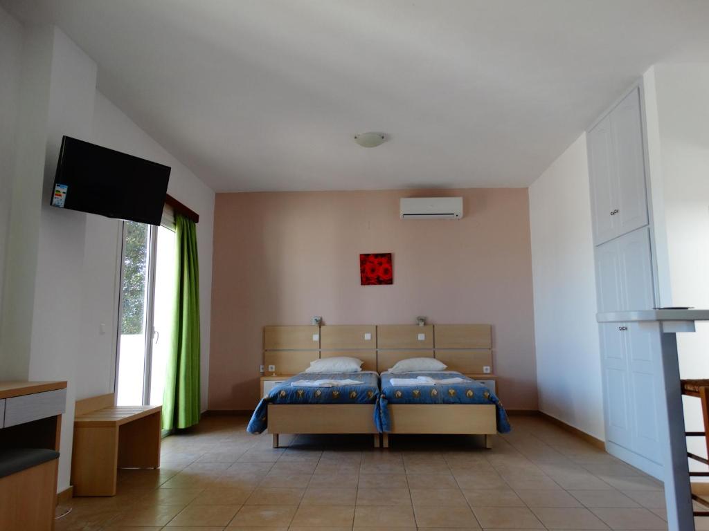 Paradiso Hotel Corfu Sea View Apartments with Pool in Ipsos — Hotel rooms in Ypsos, Ionian Islands