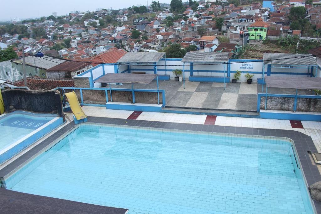 Rumah Syariah & Kolam Renang Bugenville Guesthouse