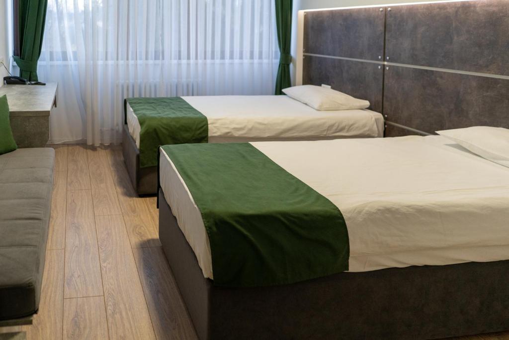 Deluxe szoba kétszemélyes vagy 2 külön ággyal - városra nyíló kilátással