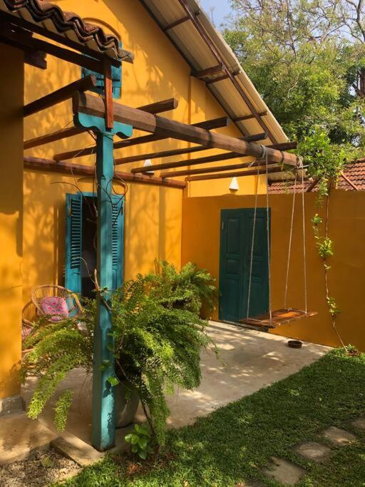 yellow house mawella photo