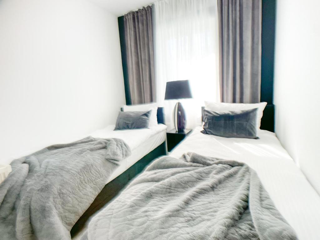 MAIER Suite Nürnberg - E02 - Balkon - Parkplatz - 24h Self Check-in - 5