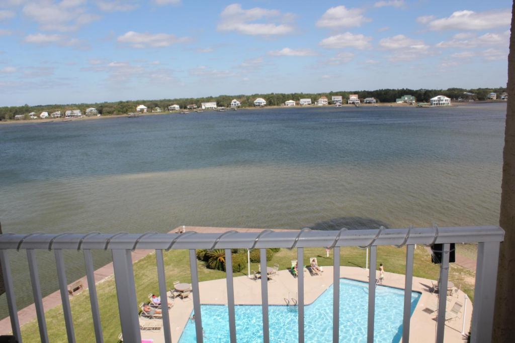 Compass Point 506 by ALBVR - Beautiful Lagoon-Front condo with great views, fishing pier, outdoor pool, indoor pool, and fitness room, Gulf Shores