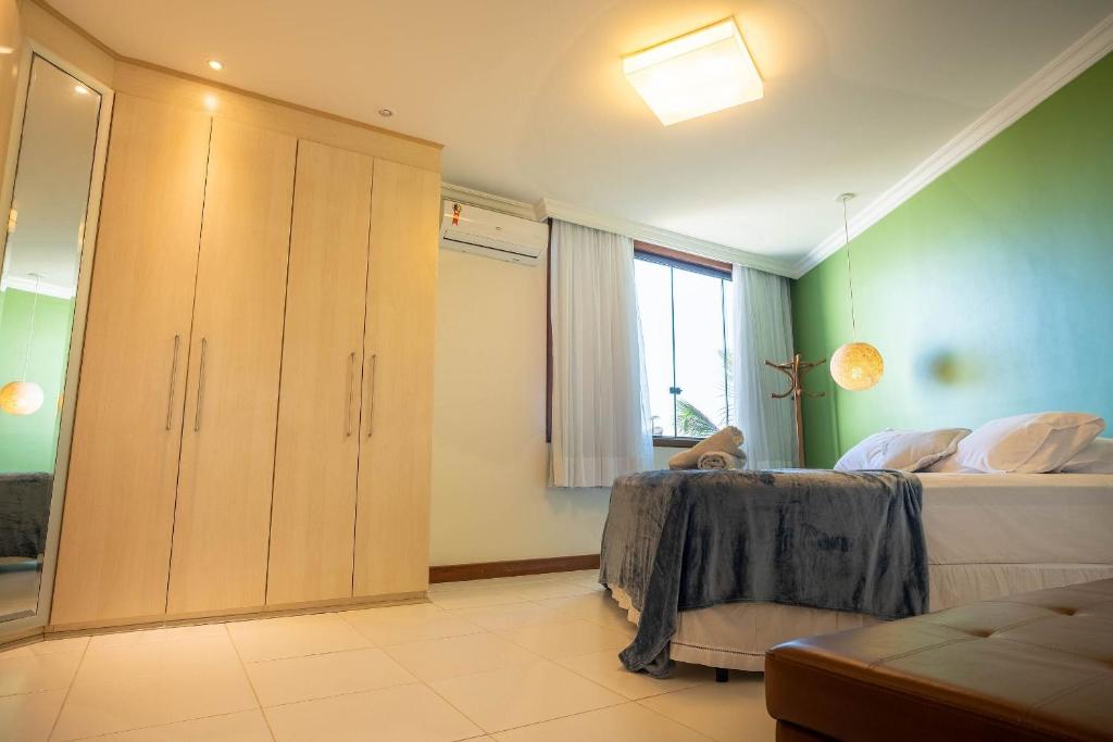Casa de alto padrão perto da praia de Costazul - WIFI 200MB - Piscina privativa - Netflix - 3 Quartos - Garagem - Cozinha equipada - Churrasqueira - Pet Friendly