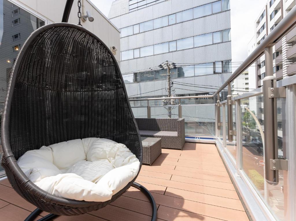 Shared lounge/TV area, Tabist MAYUDAMA CABIN in Yokohama