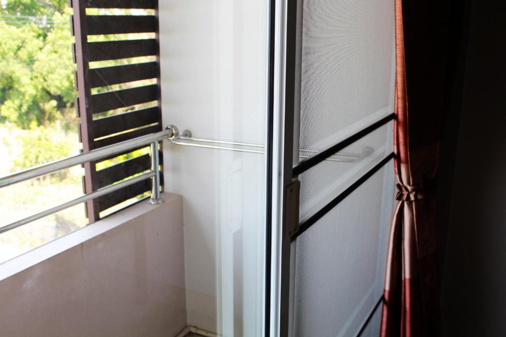 Balcony/terrace, Pornkasem House in Chiang Rai