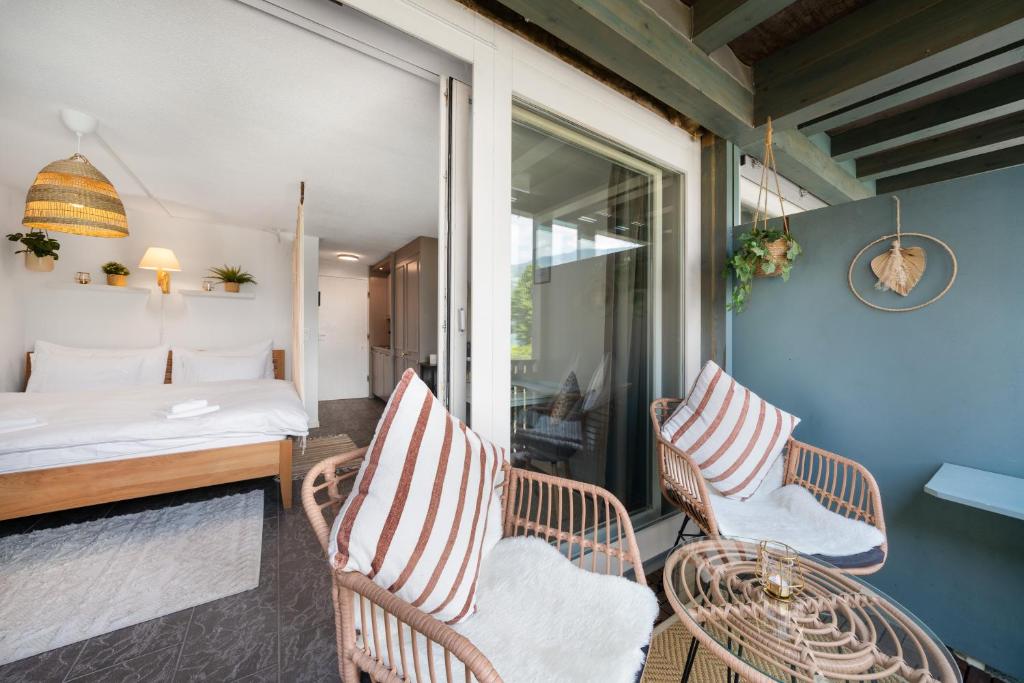 "Boho Oase" with lake view and pool photo