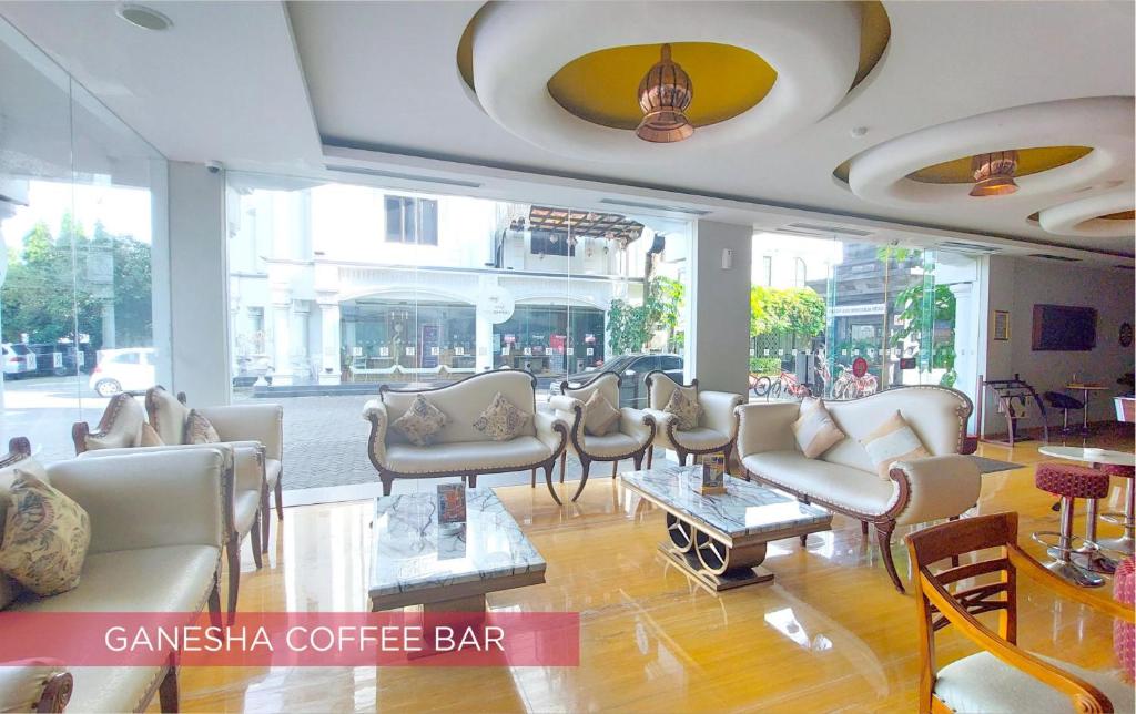 Shared lounge/TV area, Ramada Suites by Wyndham Solo in Surakarta