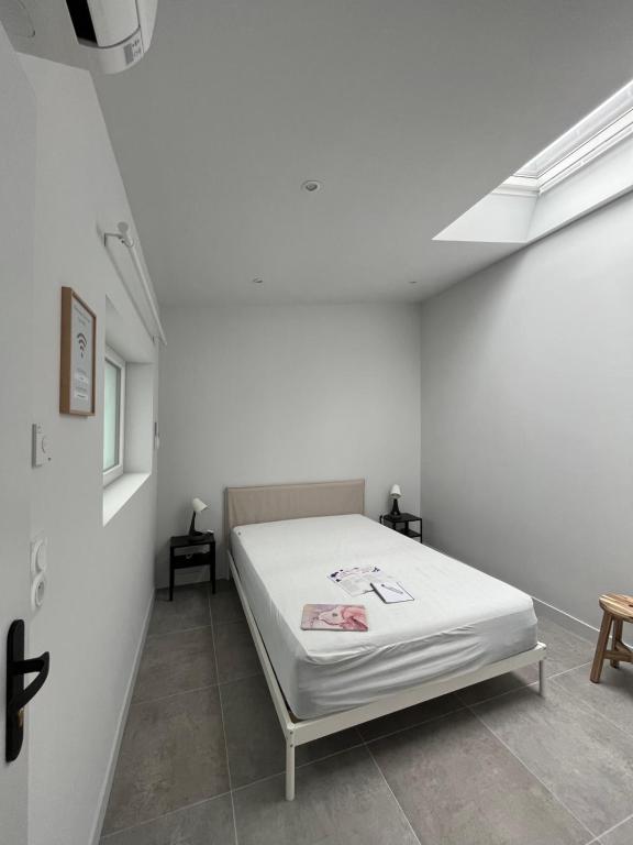 Chez Oma I 1 appartement indépendant OPI I 3 chambres privatives avec salle d eau et salon commun cuisine commune WC commun patio commun - 5