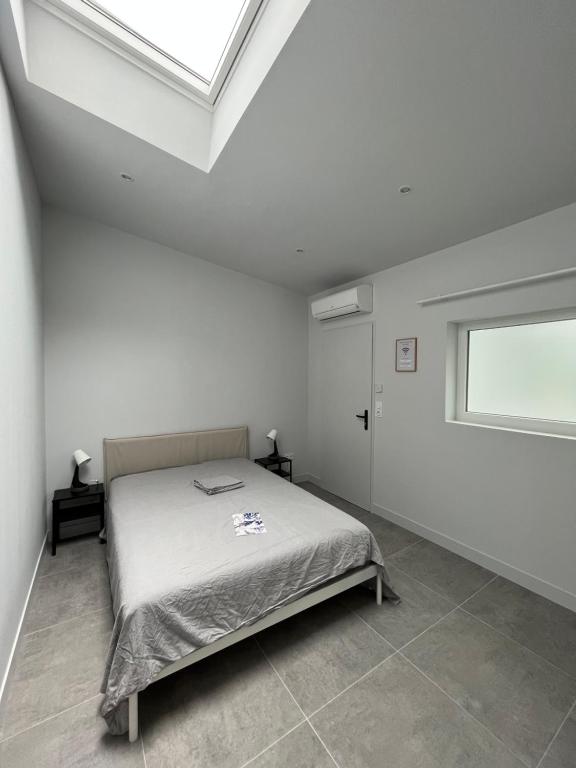 Chez Oma I 1 appartement indépendant OPI I 3 chambres privatives avec salle d eau et salon commun cuisine commune WC commun patio commun - 4