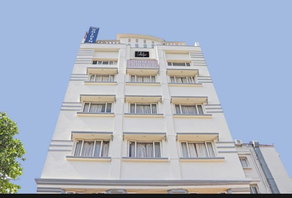 Capital O 77658 Hotel Golden Way photo