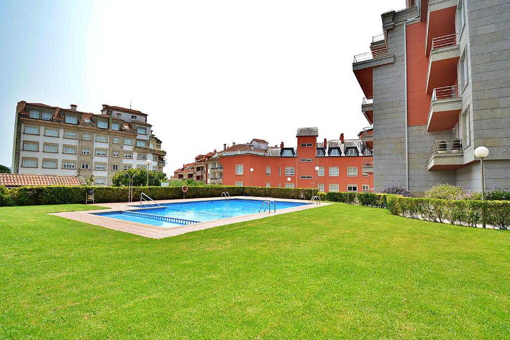 GALIHOST - Apartamento con piscina en el centro de Sanxenxo, Sanxenxo