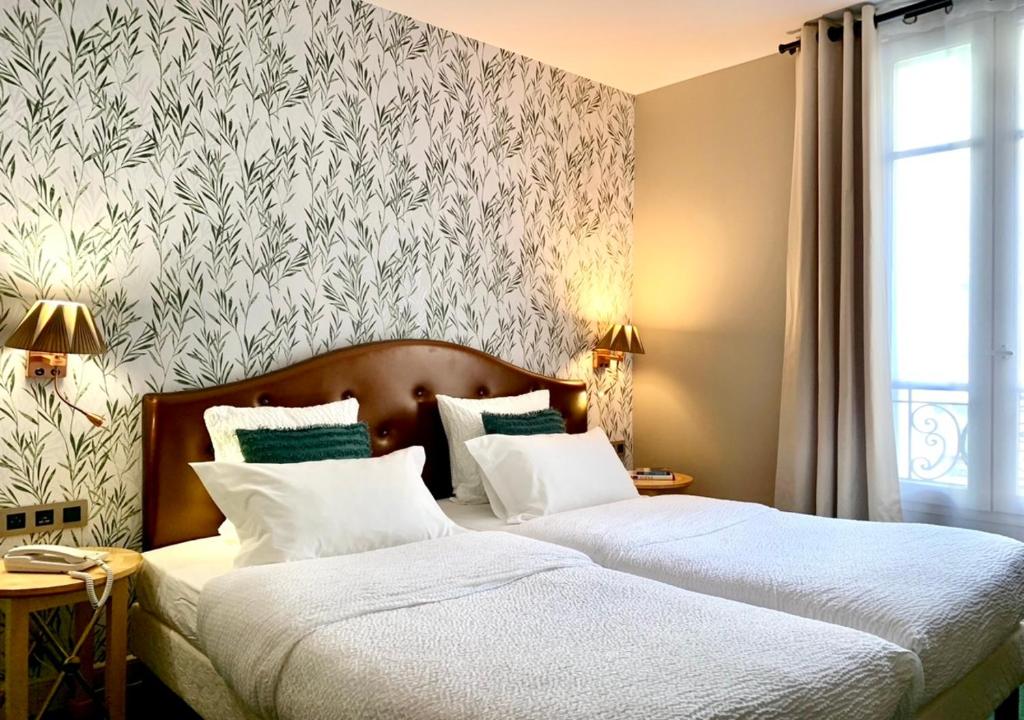 ホテル セントラル サンジェルマン (Hotel Central Saint Germain) 客室内ベッド