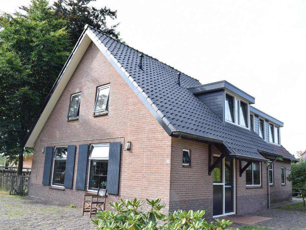 Spacious farmhouse with a barbecue near the Veluwe
