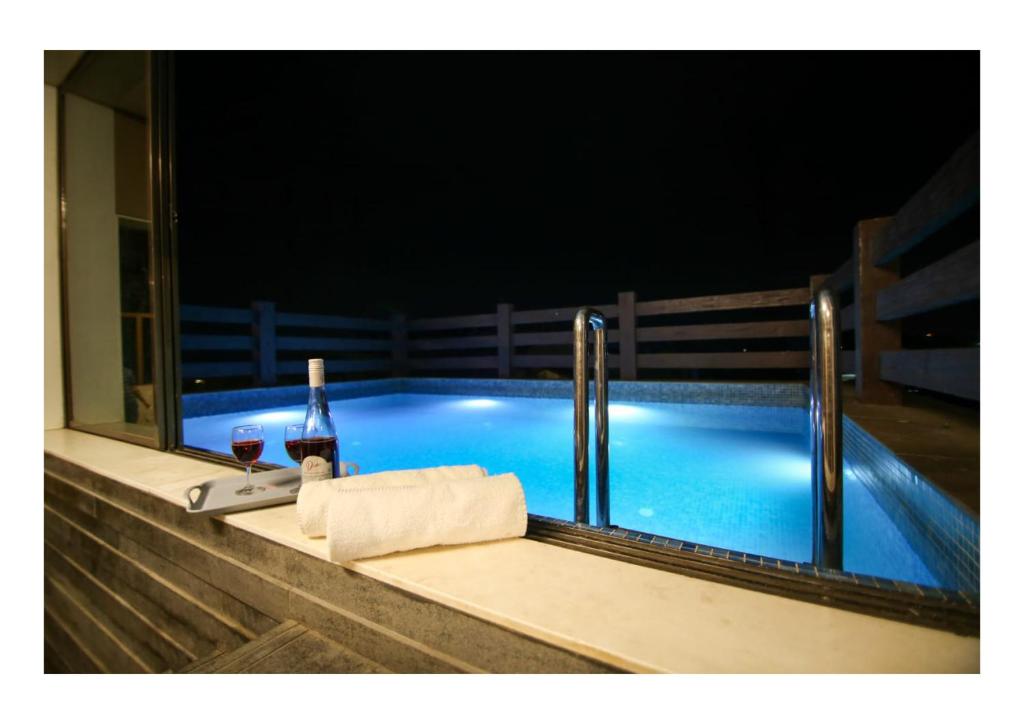 4BHK Luxury Villa with Rooftop Pool - MARS Sky Villa photo