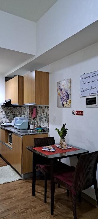 Zhamira's Condo near Airport & Malls, Clean& Comfy photo