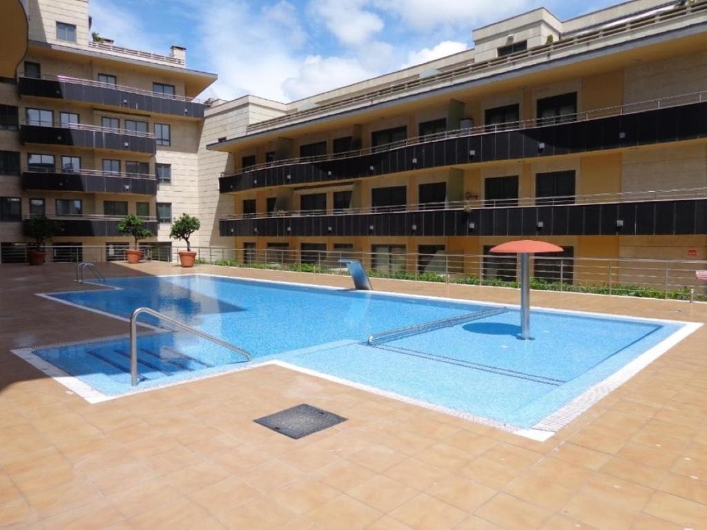 Apartamento en urbanización con piscina en Playa de Silgar - 1