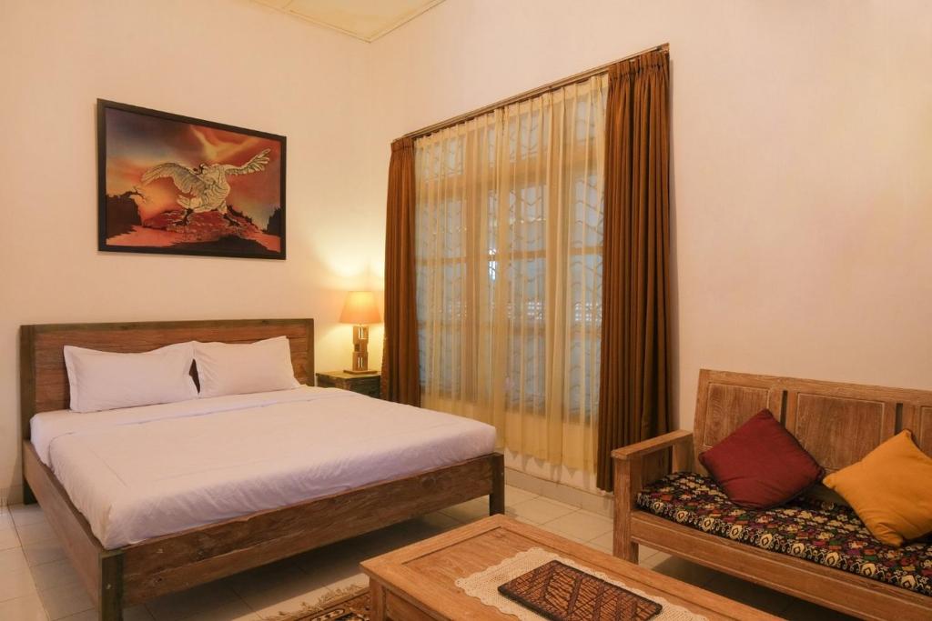 OYO 244 Griya Cemara Homestay photo