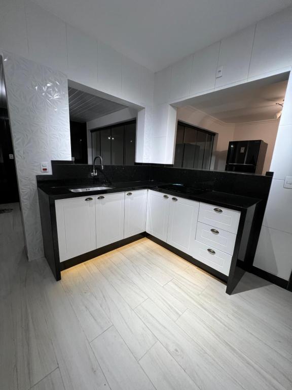 sobrado com 3 garagens