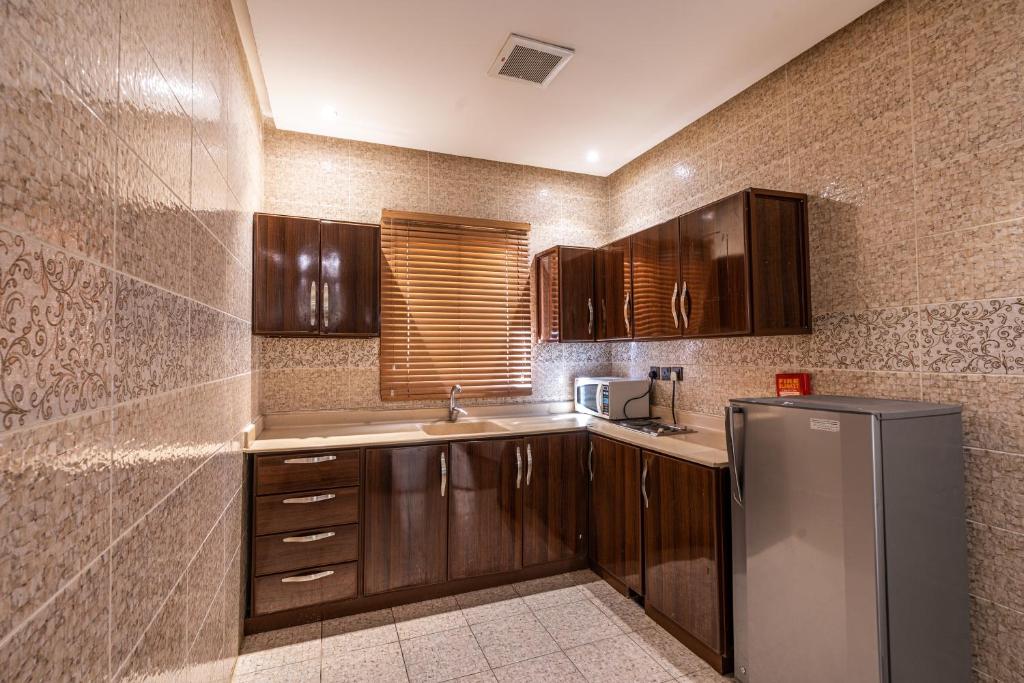 ال متعب سويتس الإزدهار 2 photo
