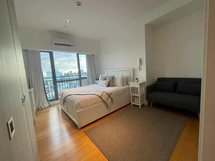 Aveline Suites Aesthetic Skydeck View ACQUA Private Residences near Rockwell Makati, Manila