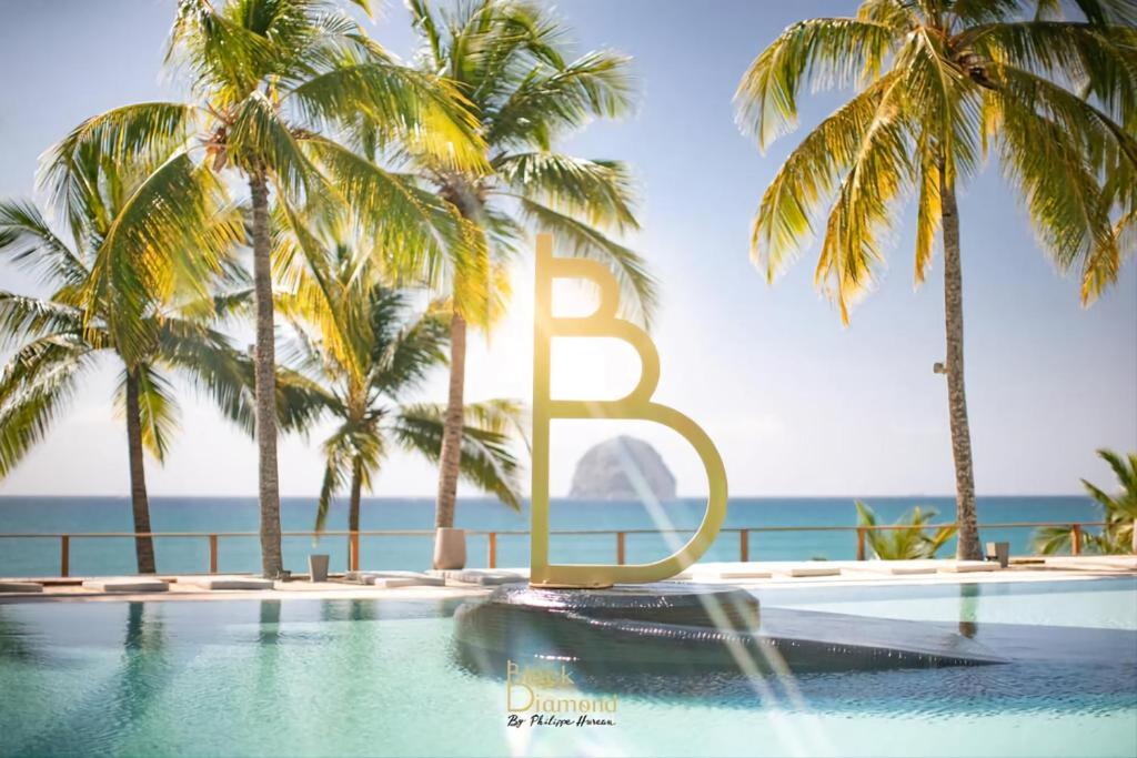 Charmant appartement avec piscine et vue sur mer, Le Diamant