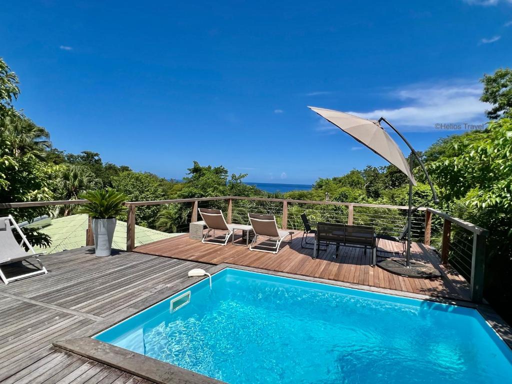 Case Coco Pointe Batterie. Piscine, vue mer, 4 p., Deshaies