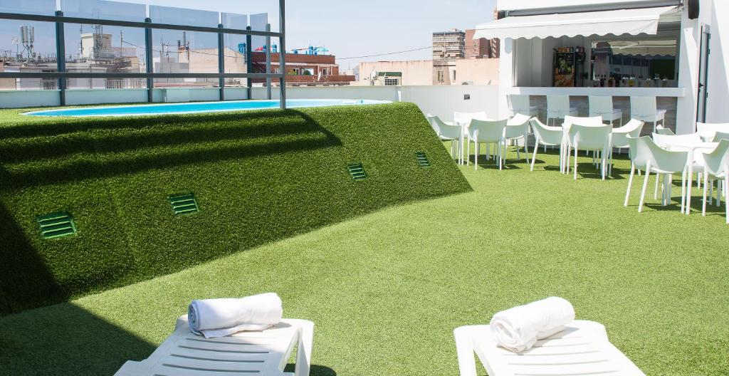Hotel Melina — Swimming pool in Benidorm, Valencian Community