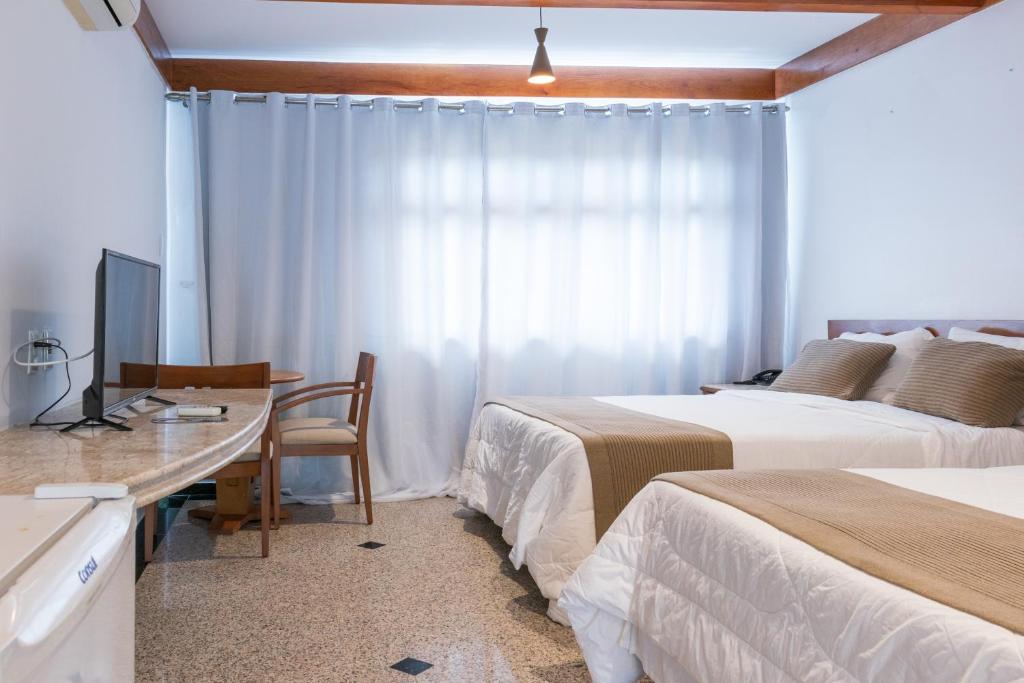 Quarto Quádruplo Luxo