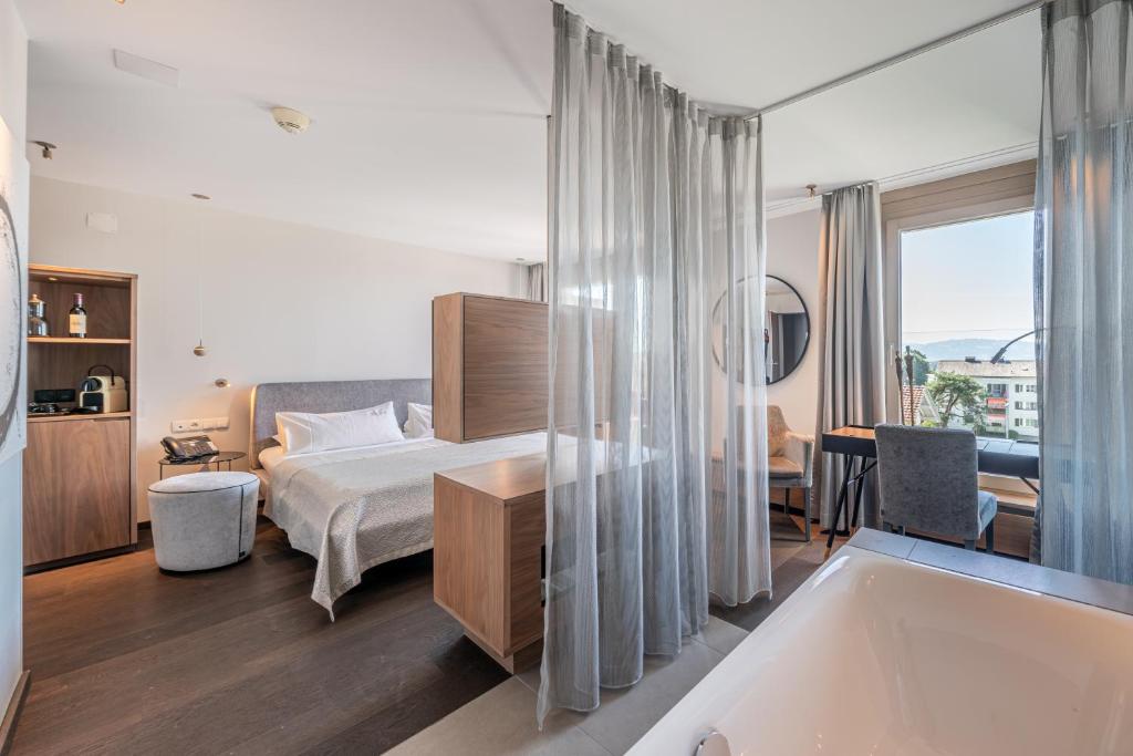 Design Lounge Panorama with Balcony and Fireplace