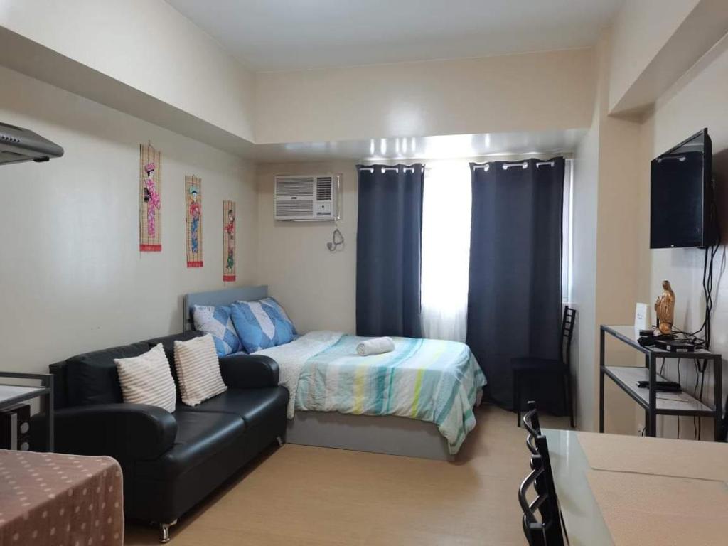 Condo in Poblacion with City and Pool view