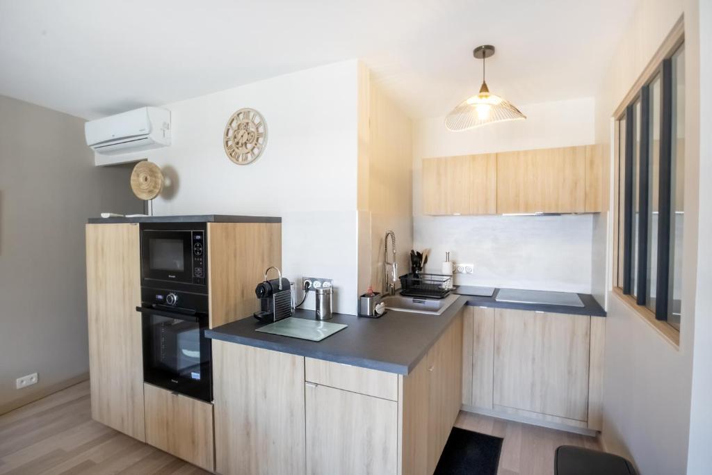 Confort du Sud T2 avec garage et WiFi en centre-ville - 3