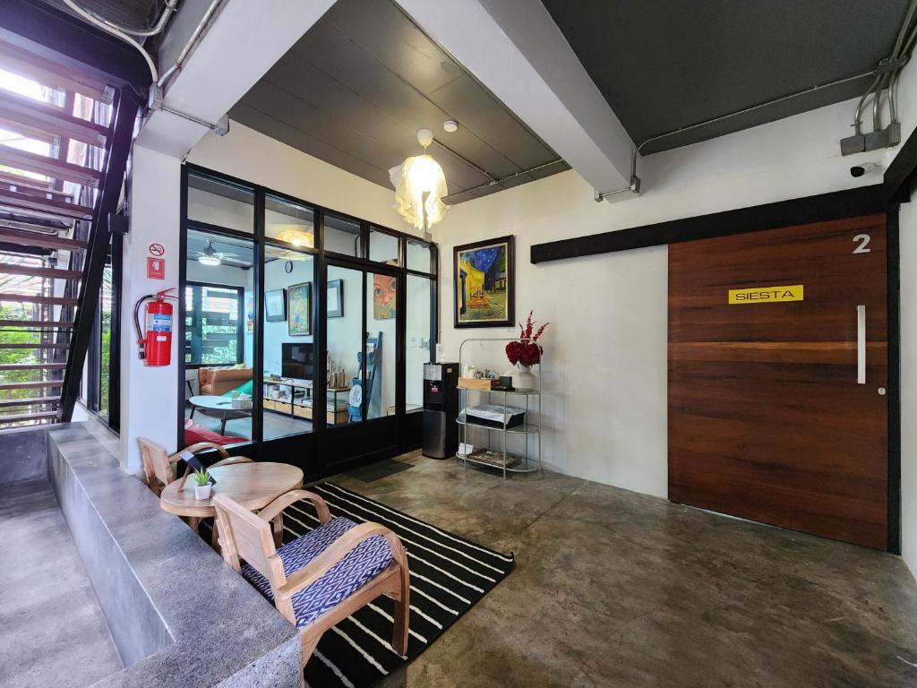 Shared lounge/TV area, Baan Mai Kradan in Chiang Rai