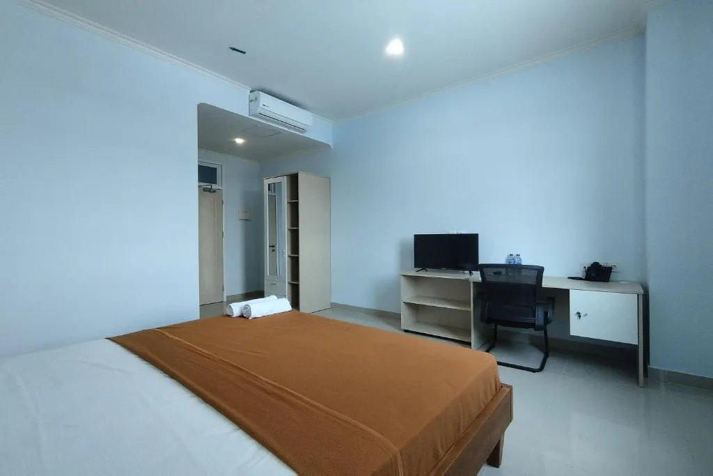 Hotel Sutha Inn Syariah，位于占碑市的酒店
