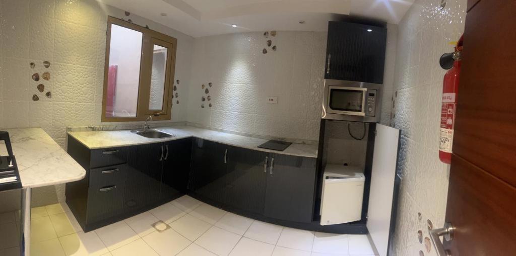 Kitchen, Al Sadarah Hotel Apartments in Sohar