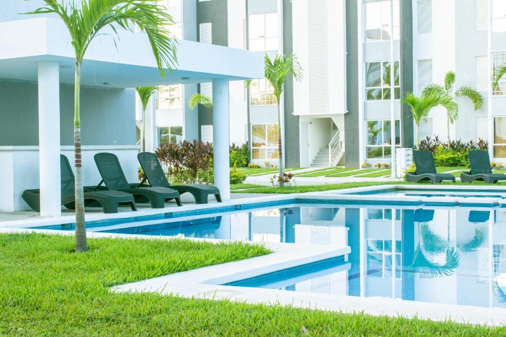 Alberca, Playa Cercana & Club de Playa opcional -Departamento E13D302, Gallinero