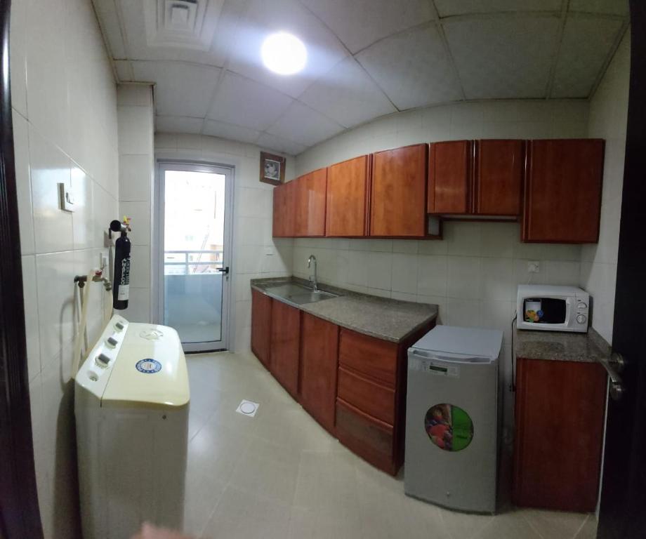 Kitchen, Al Khaleej Plaza Hotel Apartment-Baithans Group in Ajman