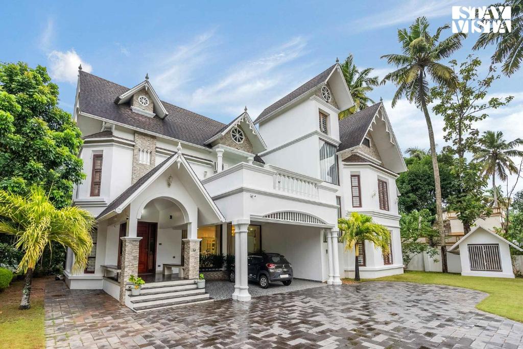 Raindrops by VEO - Part of StayVista, Trivandrum