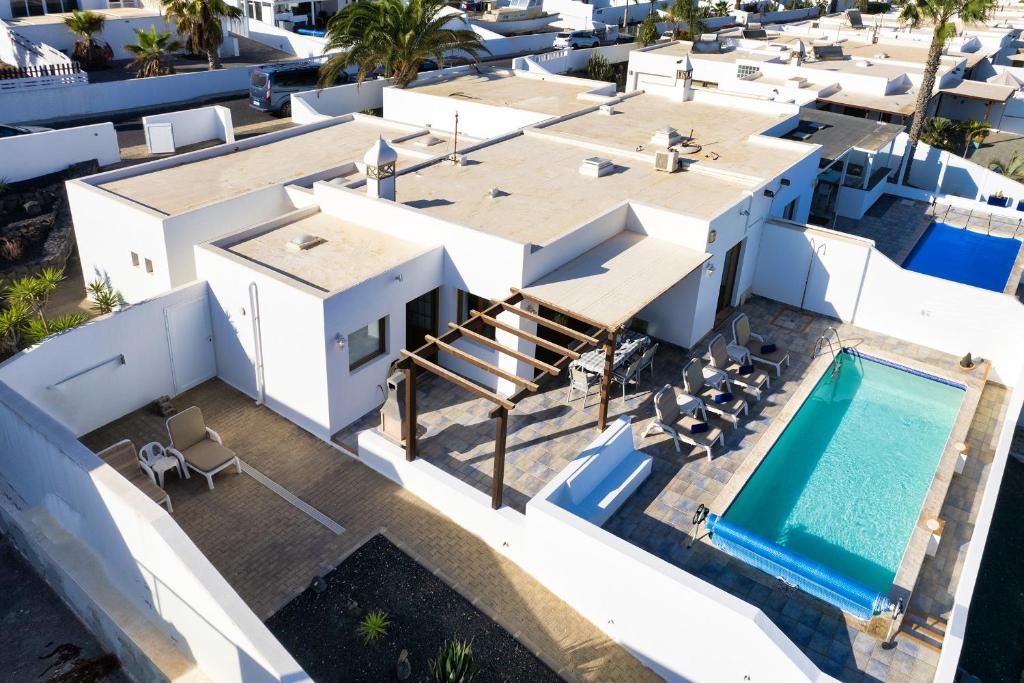 Lava and Sea - Private pool, BBQ and amazing sea views By Lanzarote Vacation Homes, Playa Blanca