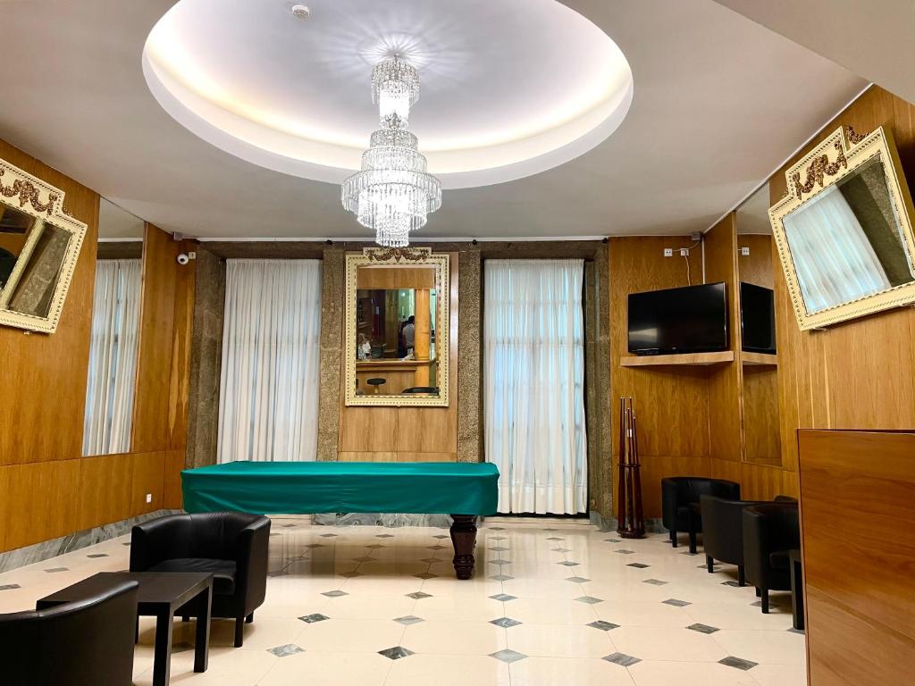 Shared lounge/TV area, Hotel Universal in Porto