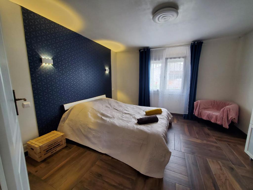 Appart 28m2 avec jardin et parking privés, chambre séparée
