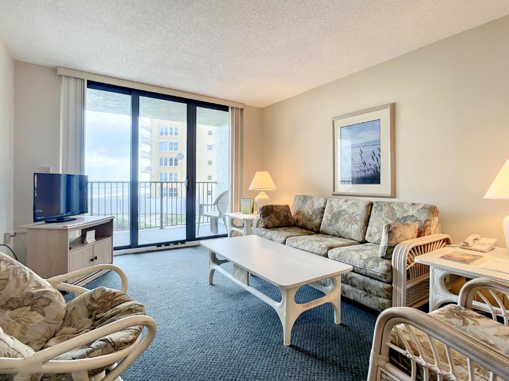 Ocean View with a beachfront pool at Ocean Trillium Condo ~ 203, New Smyrna Beach