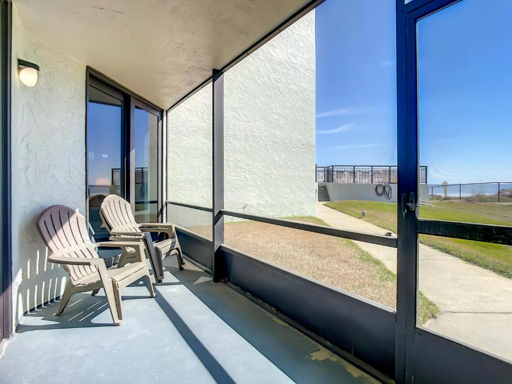 Ocean View with a beachfront pool at Ocean Trillium Condo ~ 102, New Smyrna Beach