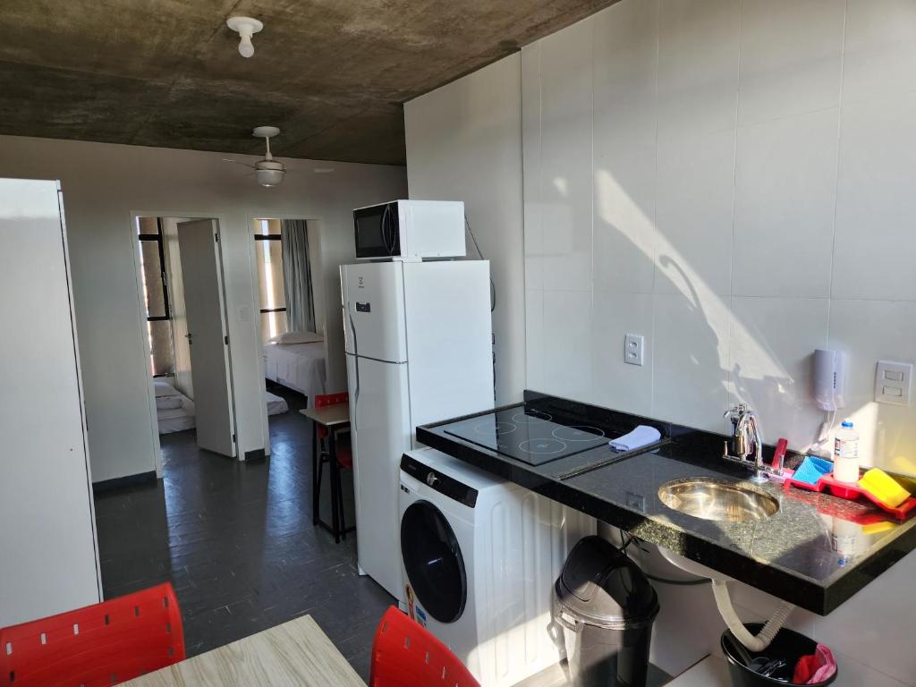 Double Kit 309: dois quartos no centro