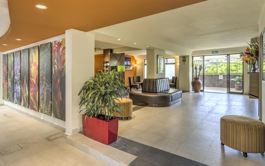 Lobby, Hotel Residence Inn Suites Cristina in San Jose